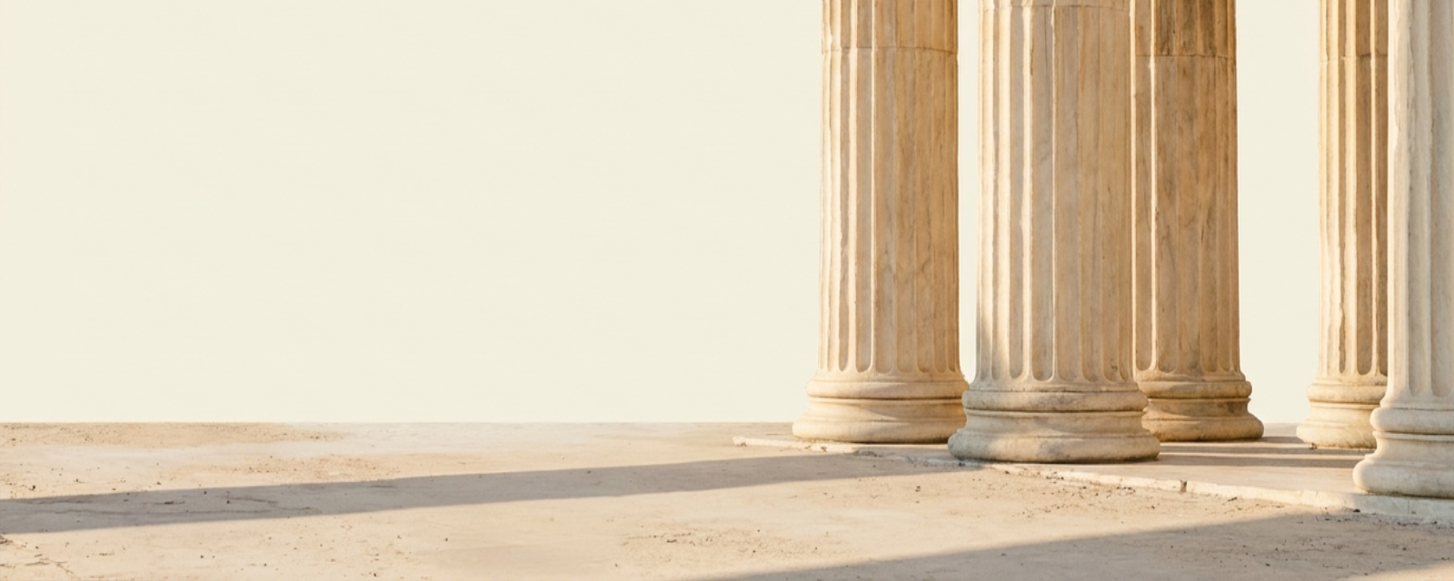 Stone column bases in evening light